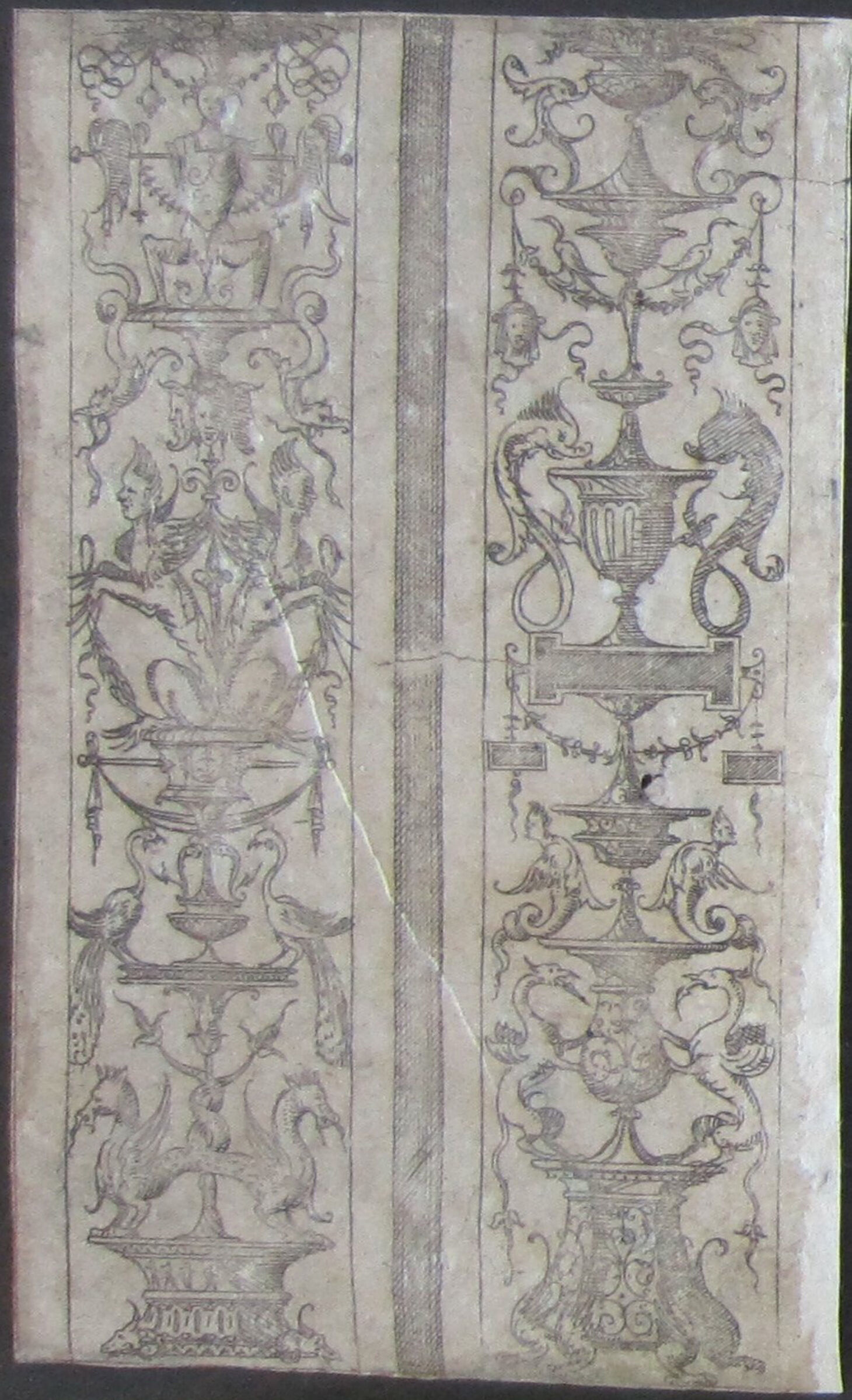 Two Grotesques Separated By A Band Of Vertical Shading, The Left Grotesque With Peacocks And Winged Monsters