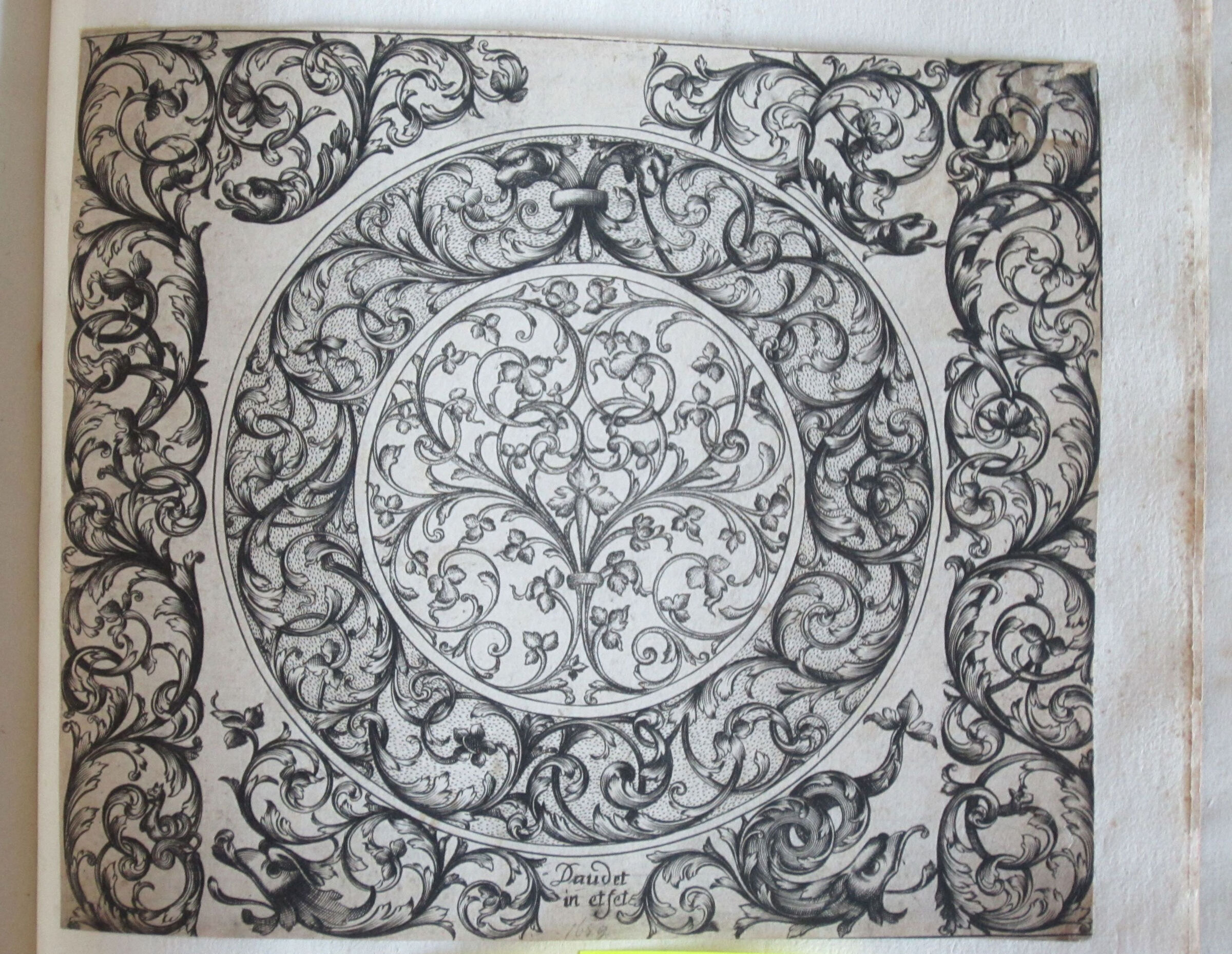 Foliate Moresques Centered By A Large Circular Motif With A Border With A Stippled Background