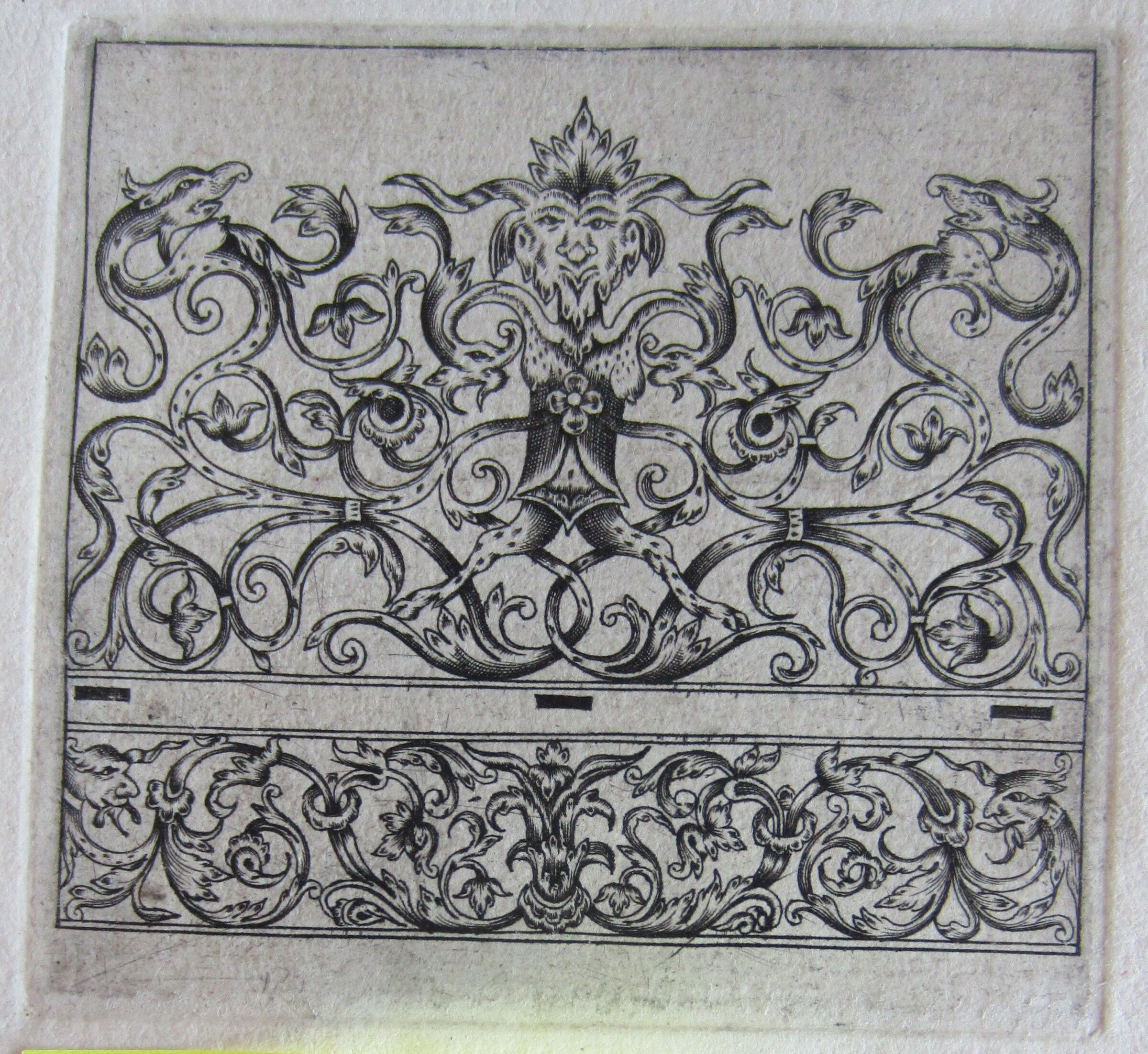 Foliate Ornament With A Satyr's Head, A Frieze Terminating In Satyrs' Heads Below