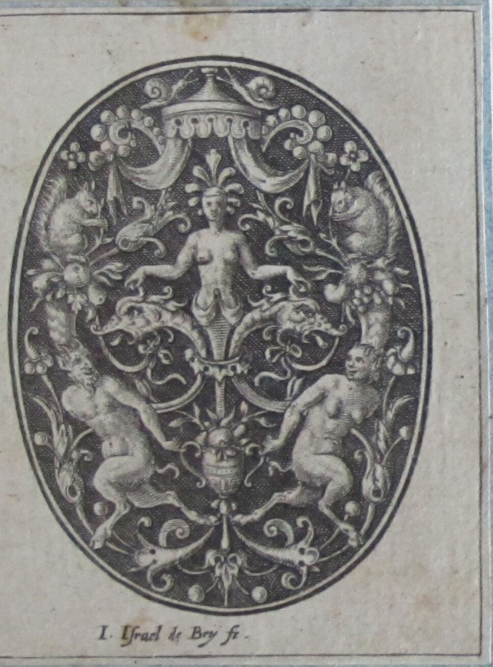 Oval Groteque With A Female Torso Flanked By Squirrels And A Satyr Couple