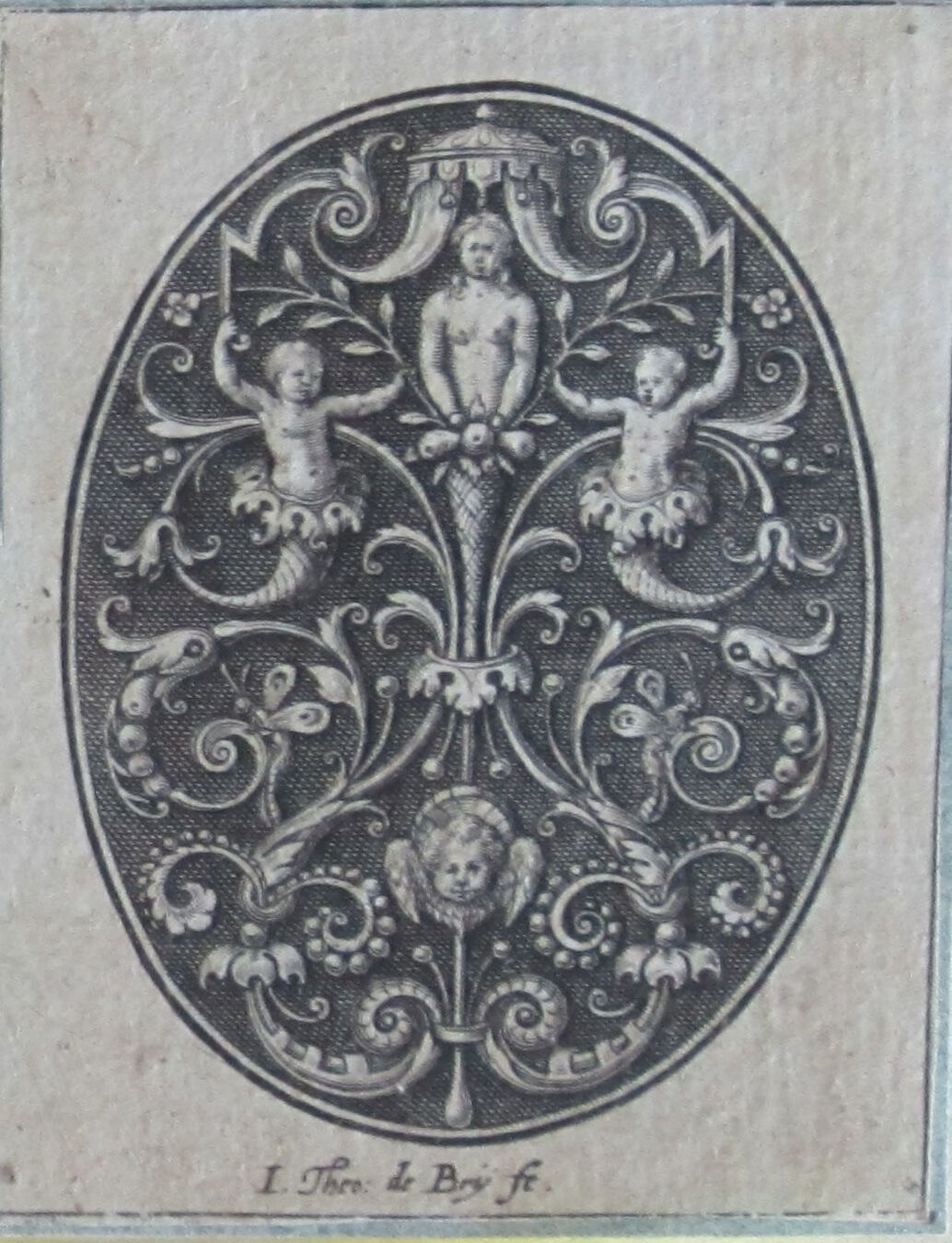 Grotesque With Female Torso Flanked By Putti Supporting A Canopy And Holding Blossoming Branches