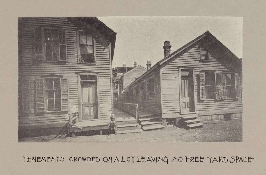 Housing, Conditions: United States. Wisconsin. Milwaukee. Tenements: Housing Conditions: Milwaukee: Tenements Crowded On A Lot Leaving No Free Yard Space.