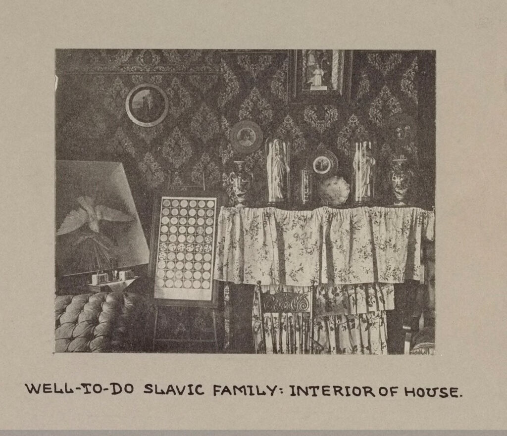 Housing, Conditions: United States. Pennsylvannia. Pittsburgh. Houses; Streets; Yards: Environment After Immigration, Perpetuation Of European Standards In America, Housing Conditions, Pittsburgh, Pa.: Well-To-Do Slavic Family: Interior Of House.