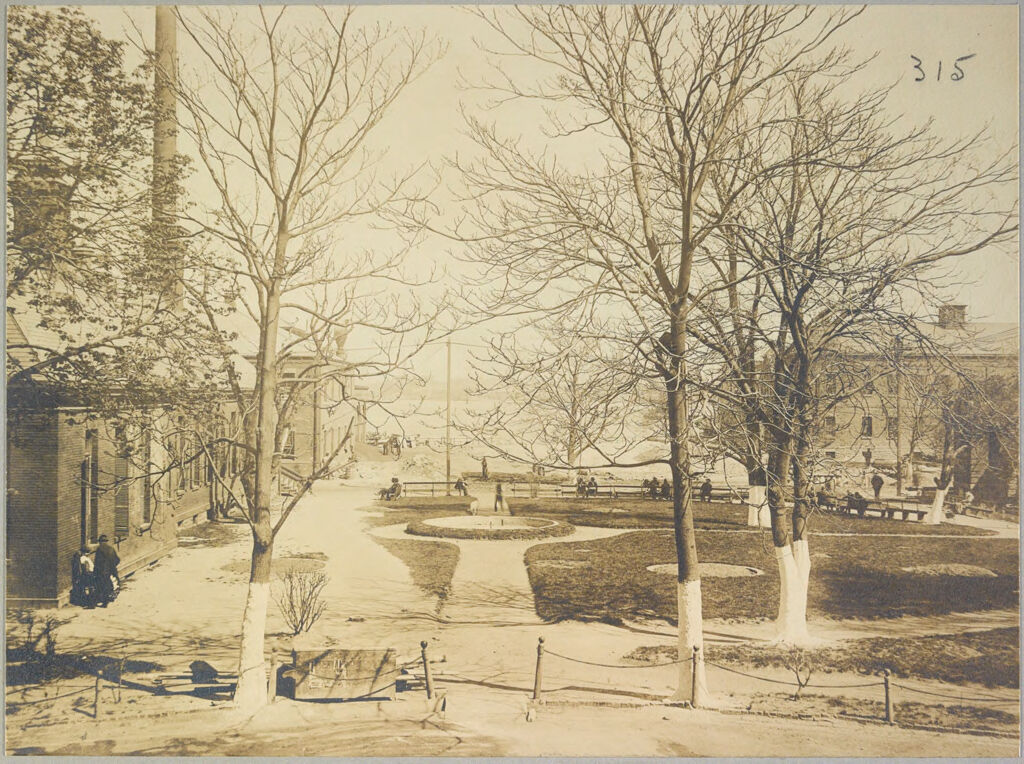 Charity, Hospitals: United States. New York. New York City. Bellevue Hospital, Manhattan: Bellevue Hospital, Manhattan (New York City Almshouse System): Yard, East River In Distance