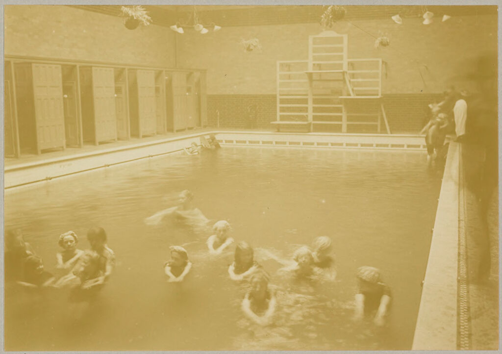 Health, Baths: Great Britain, England. London: Lambeth Baths: Social Conditions In London, England, 1903: Women's Swimming Pool At Lambeth Baths - School Children Having Swimming Lesson