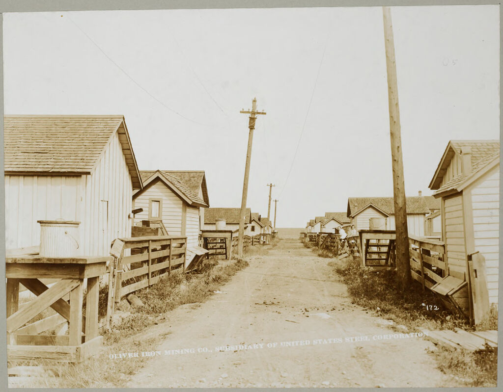 Housing, Industrial: United States. Minnesota: Industrial Housing In Mining Villages. Alleys: Oliver Iron Mining Company. Subsidiary Of The United States Steel Corporation: Ii. Vermillion District, Ely, Minn.  Alley In Mining Location, Pioneer Mine.  Showing Garbage Cans And Earth Closet.