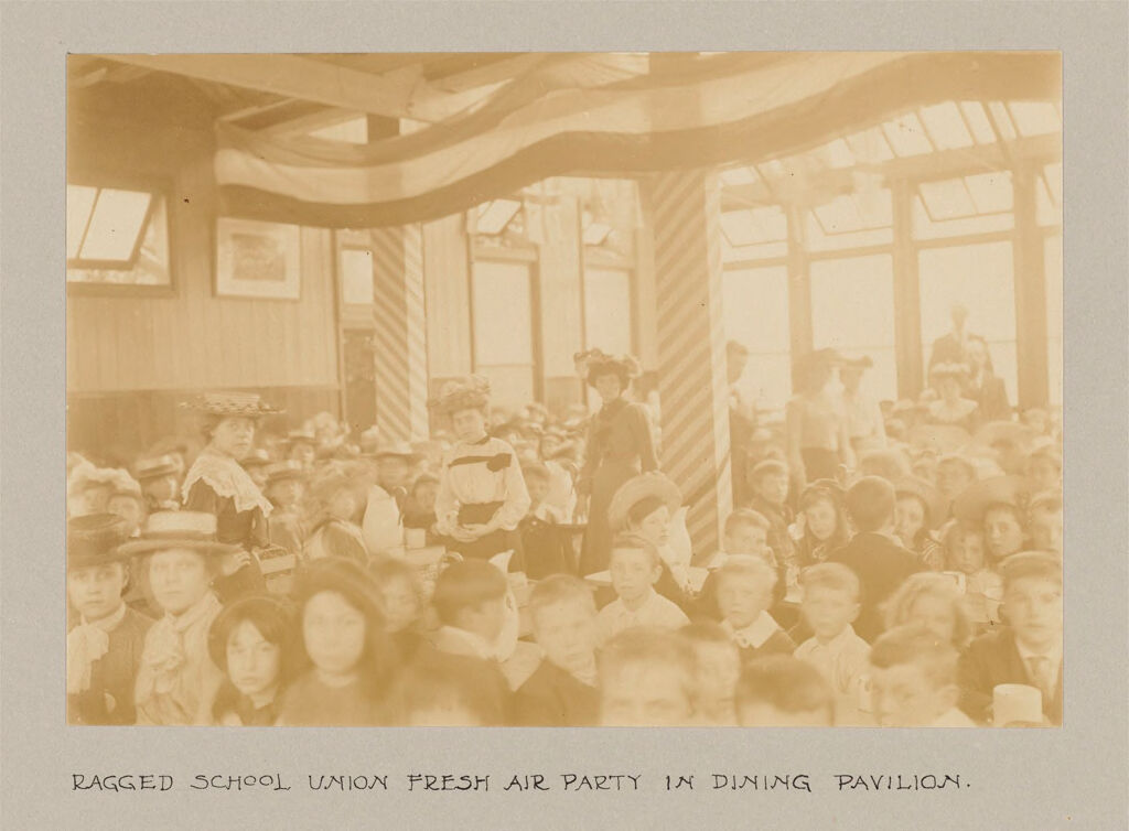 Recreation, Outings: Great Britain, England. London. Holiday House, Ragged School Union: Social Conditions In London, England, 1903: Ragged School Union Fresh Air Party In Dining Pavilion.