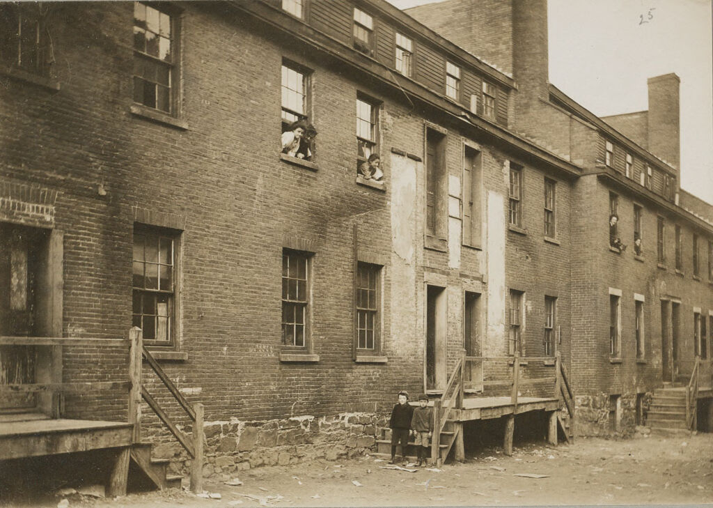 Housing, Conditions: United States. Massachusetts. Lowell. Tenements In French, Greek, And Polish Districts: Environments After Immigration. Perpetuation Of European Standards In America. Housing Conditions, Lowell, Mass.: Off Middlesex St.: Old Brick Tenements Occupied By Jews.