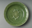 Green bowl with decoration of two fish