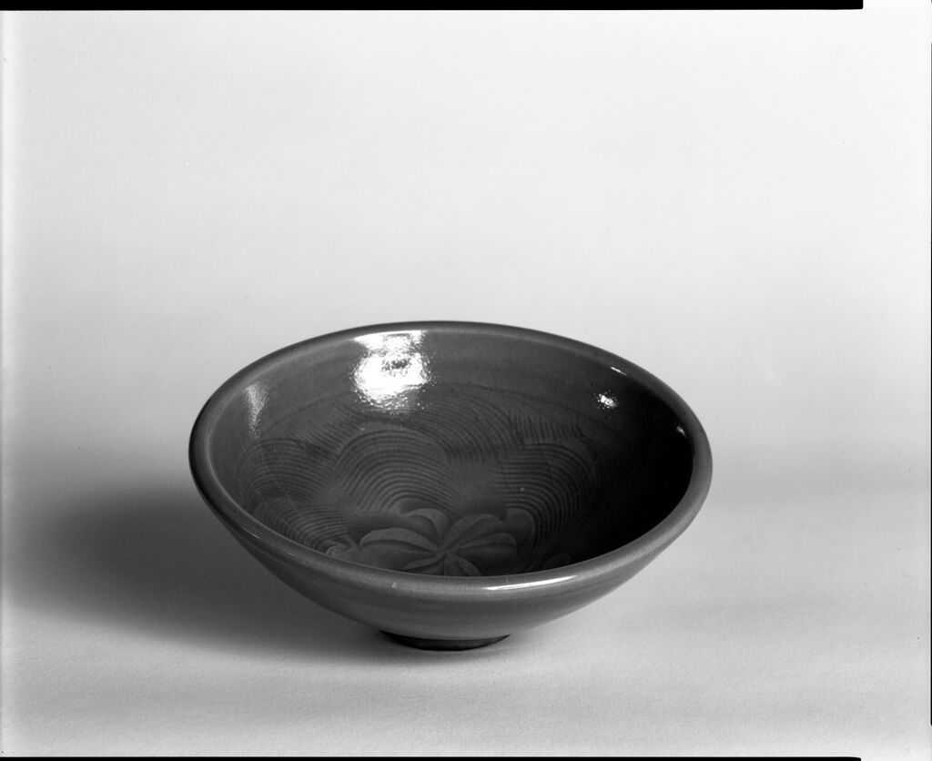 Small Circular Bowl With Stylized Lotus And Wave Decor