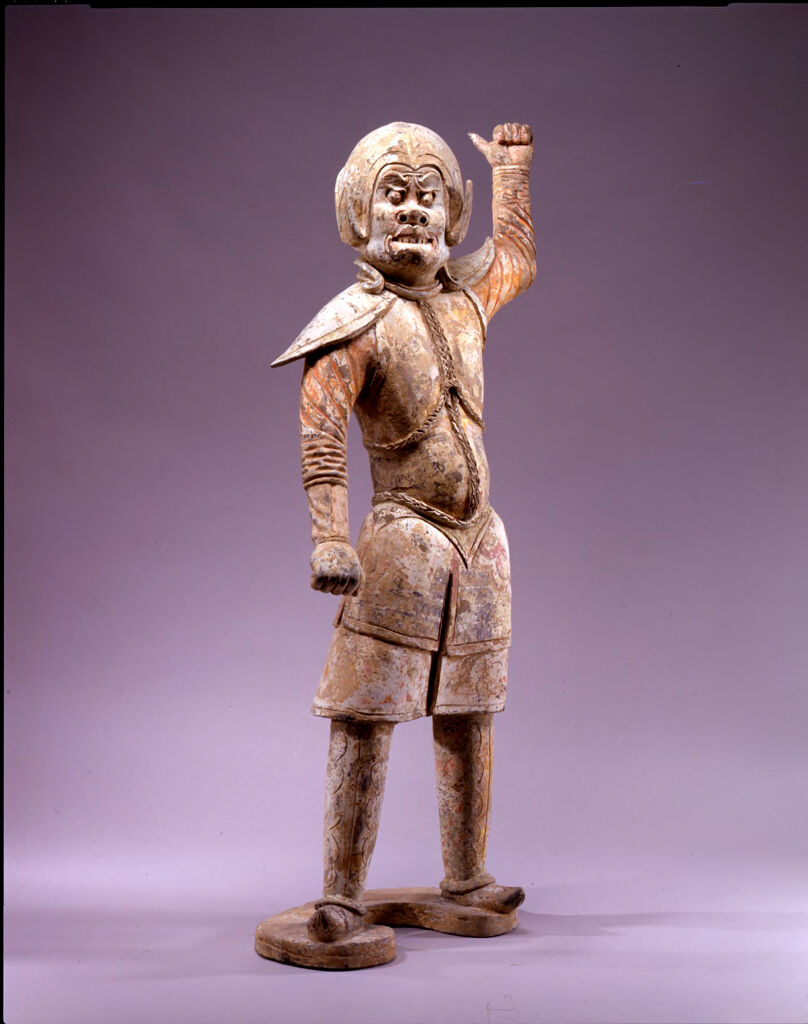 Guardian Warrior With Mouth Open, From The Tomb Sculpture Set: Pair Of Standing, Helmeted, Armor-Clad Guardian Warriors, Each With One Arm Raised And One At The Side, And Both Hands Clenched As If Holding Weapons, One Figure With Mouth Closed And Wearing Straw Shoes, One With Mouth Open And Wearing Pointed Boots