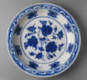 White dish with blue botanical decoration