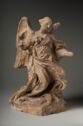 Terracotta statue of a winged figure with outstretched arms.
