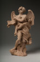 Terracotta statue of a winged figure holding a scroll.