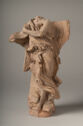 Headless terracotta statue of a winged figure holding a scroll.