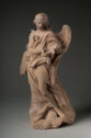 Terracotta statue of a winged figure with clasped hands.