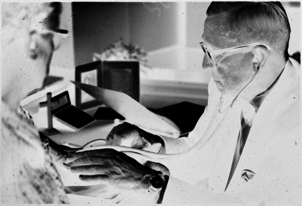 Untitled (Dr. Herman M. Juergens Examining Patient)