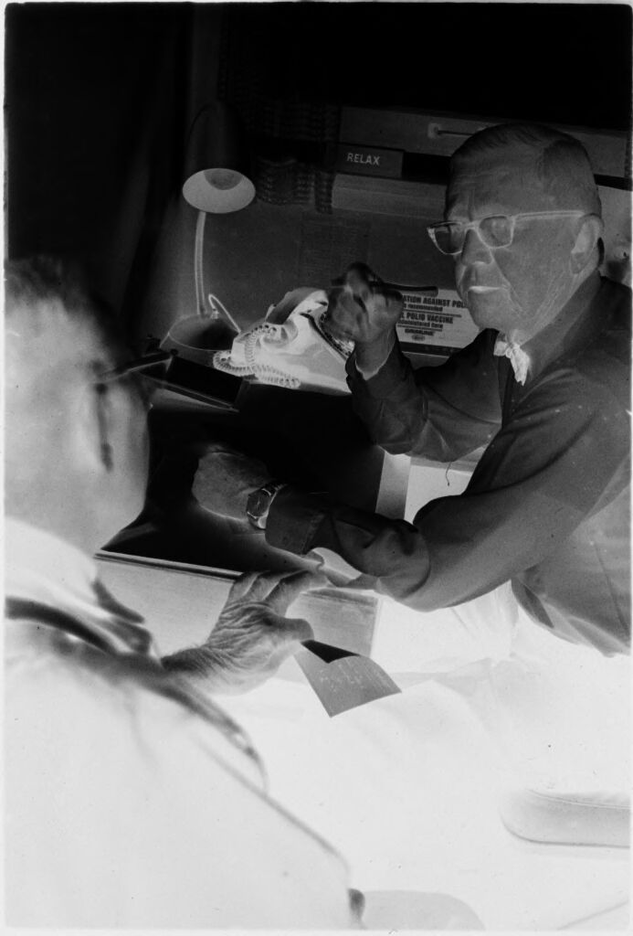 Untitled (Dr. Herman M. Juergens And Patient Talking In Exam Room)