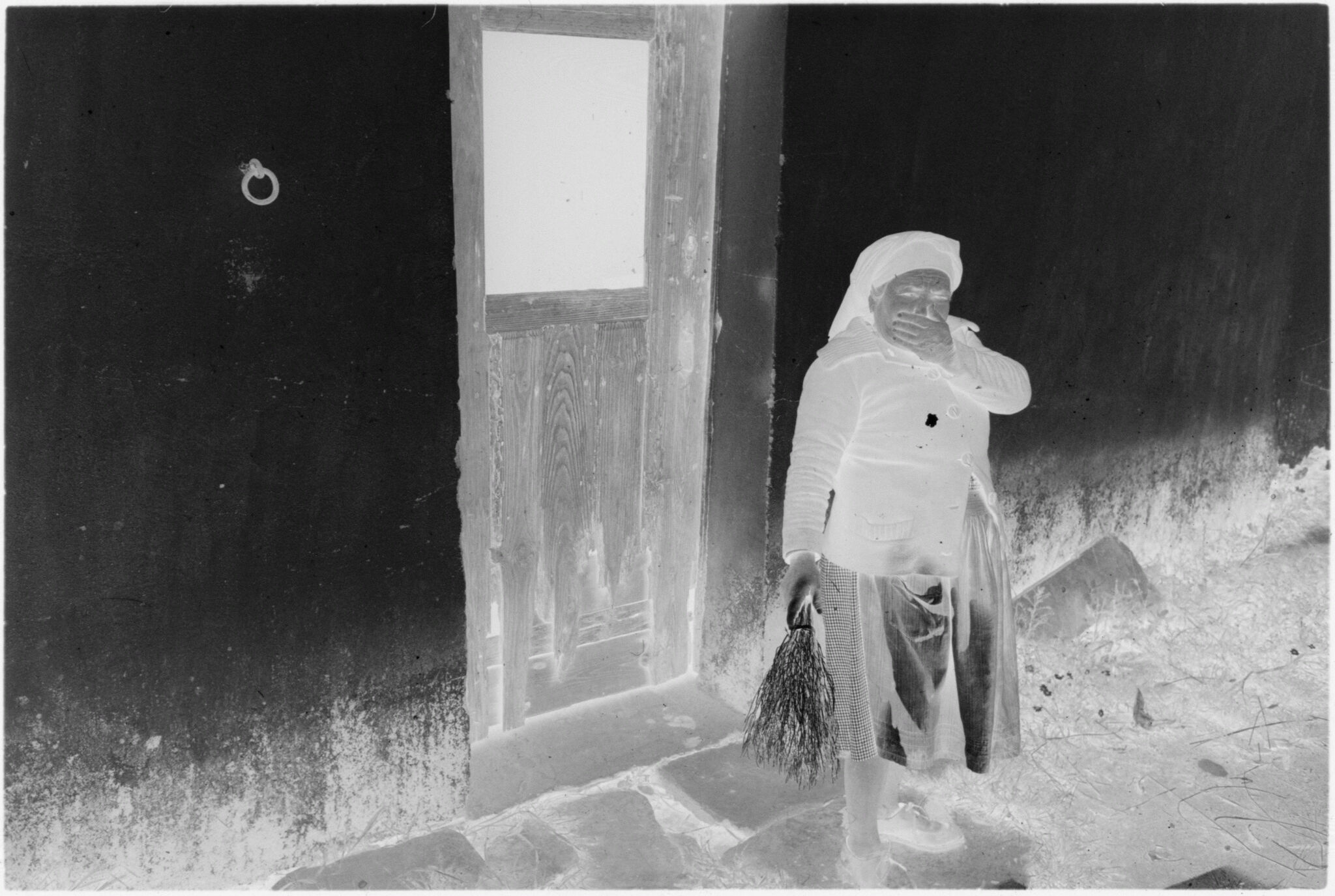 Untitled (Old Woman Standing Outside Building)