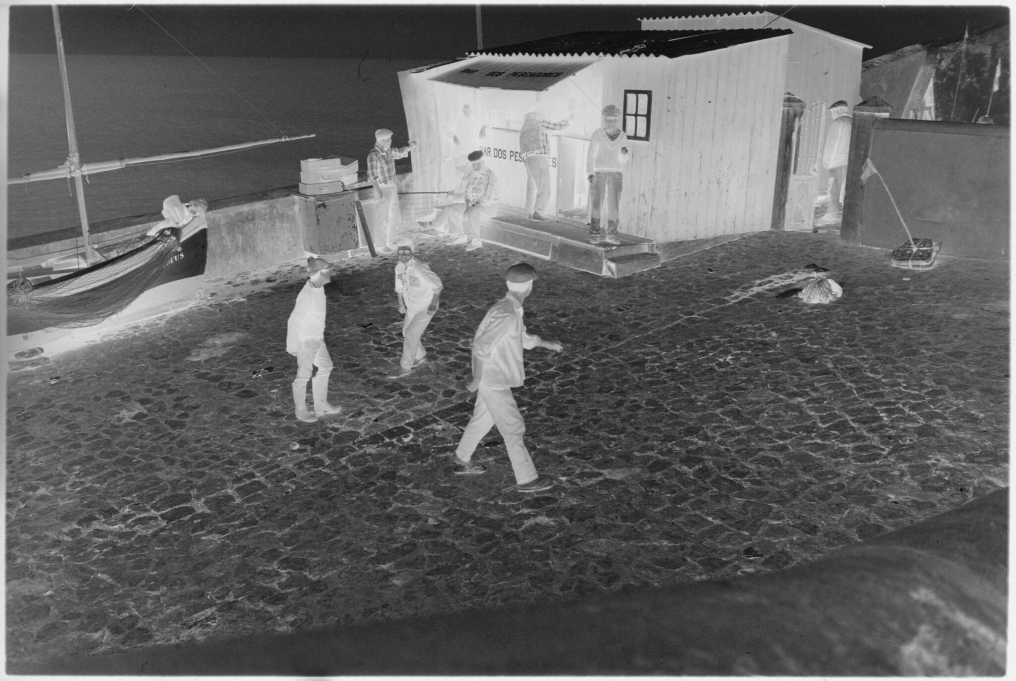 Untitled (Men In Courtyard In Front Of Fishing Shed, Nazaré, Portugal)