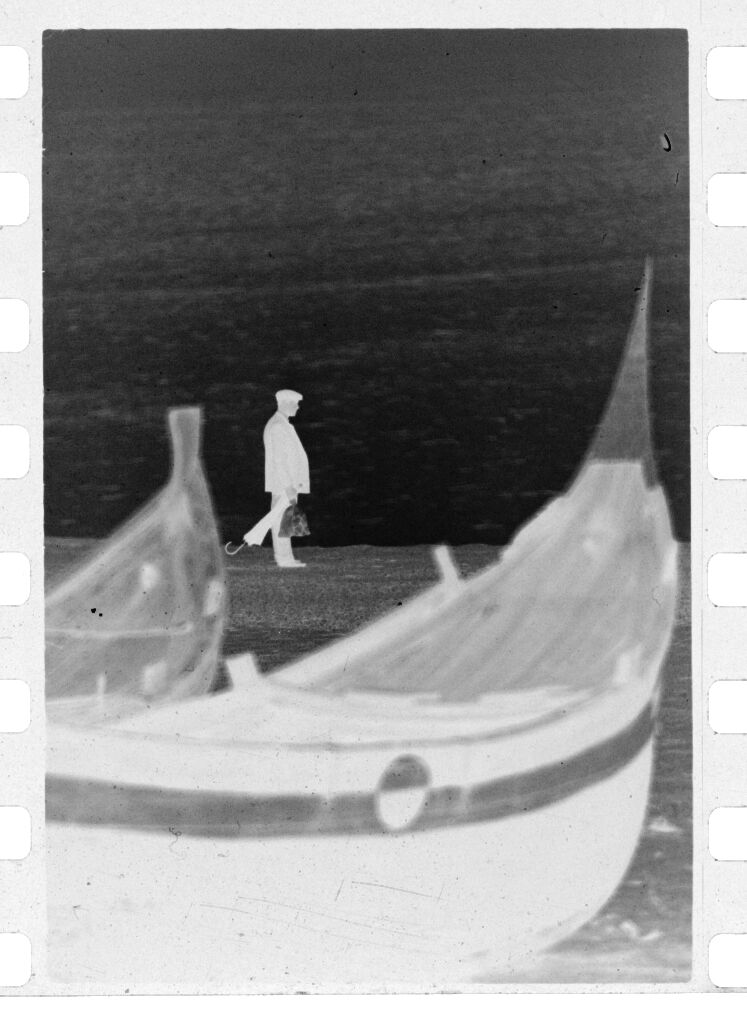 Untitled (Fishing Boats On Beach With Man Walking In The Background, Nazaré, Portugal)
