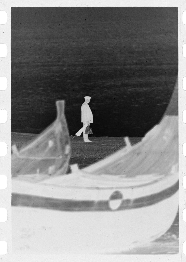 Untitled (Fishing Boats On Beach With Man Walking In Background, Nazaré, Portugal)