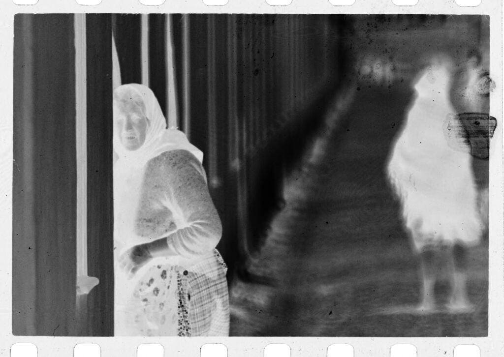 Untitled (Woman Wearing Headscarf Entering Building)
