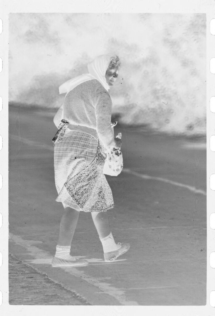 Untitled (Woman Crossing Road, Nazaré, Portugal)