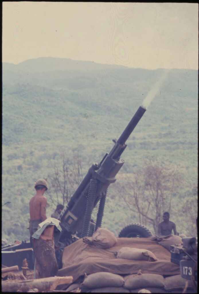 Untitled (Soldier On Top Of Hill Firing Rocket Launcher Or Rifle, Vietnam)