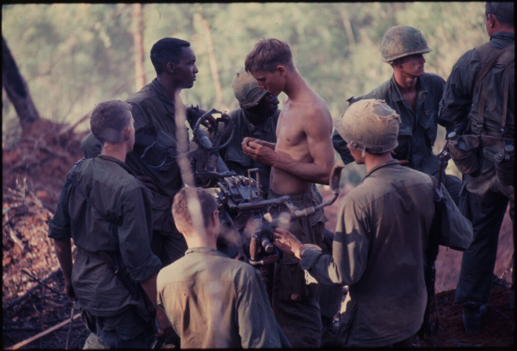 Untitled (Group Of Soldiers Setting Up Weapon In Jungle Of Central Highlands Near Dak To, Vietnam)