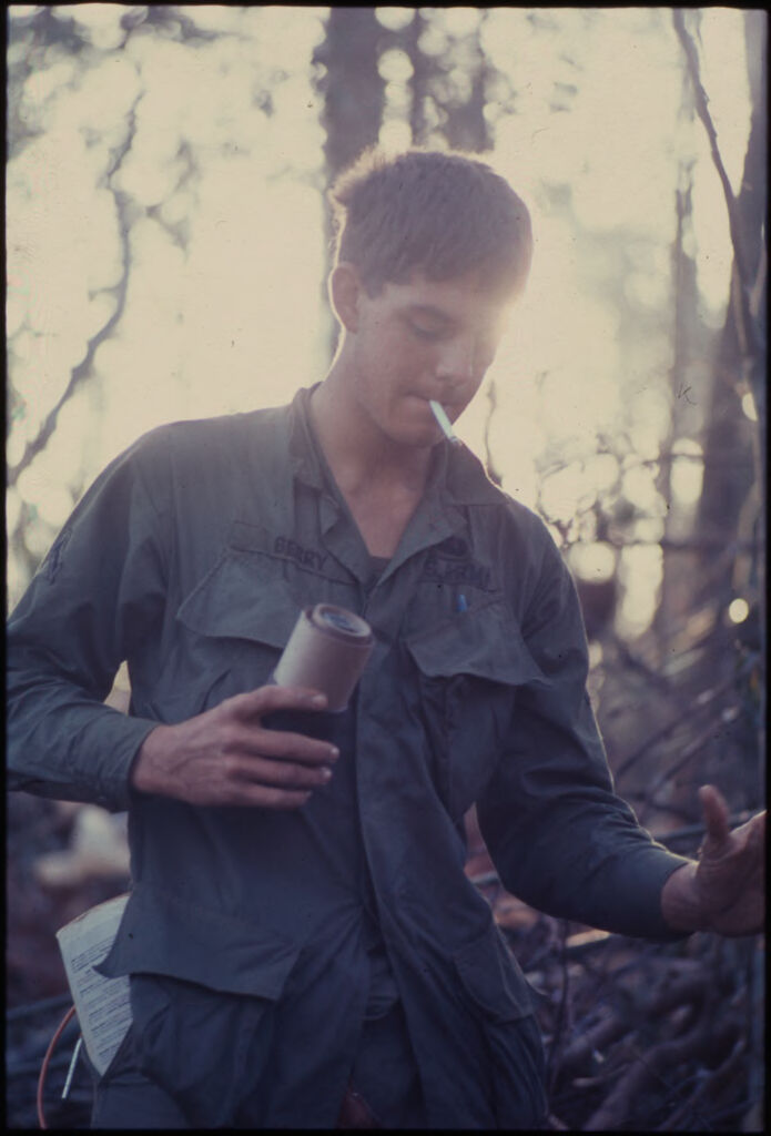 Untitled (Soldier Smoking Cigarette Holding Can In Right Hand, Central Highlands Near Dak To, Vietnam)