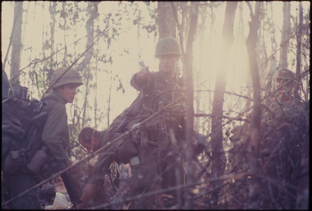 Untitled (Soldiers Walking In Jungle Of Central Highlands Near Dak To, Vietnam)