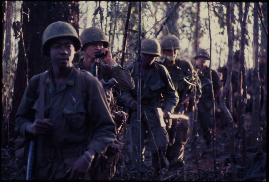 Untitled (Soldiers Walking In Jungle Of Central Highlands Near Dak To, Vietnam)