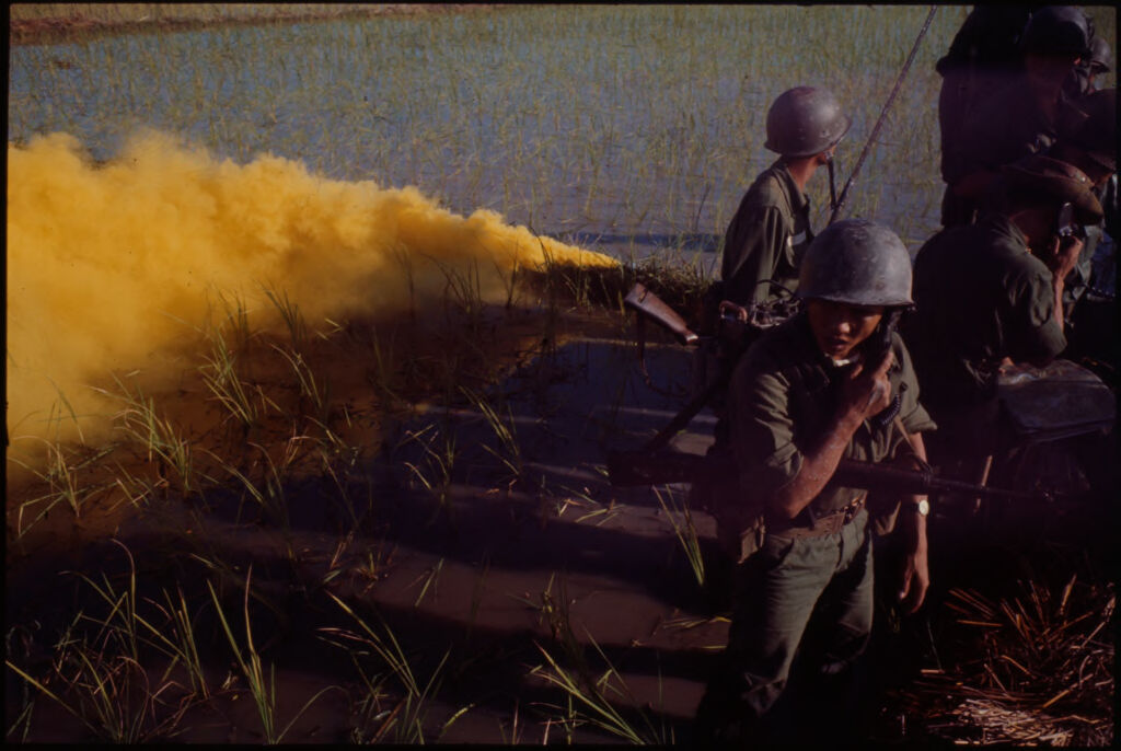 Untitled (Soldiers In Rice Paddy, Yellow Smoke Rising In Background, Vietnam)