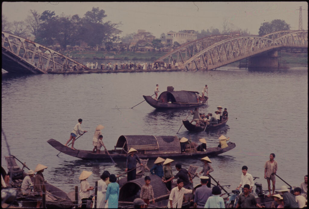 Untitled (Sampan Boats And Partially Collapsed Bridge, Perfume River, Hue, Vietnam)
