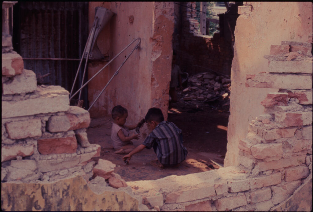 Untitled (Two Young South Vietnamese Boys Playing Inside Damaged Building, Hue, Vietnam)