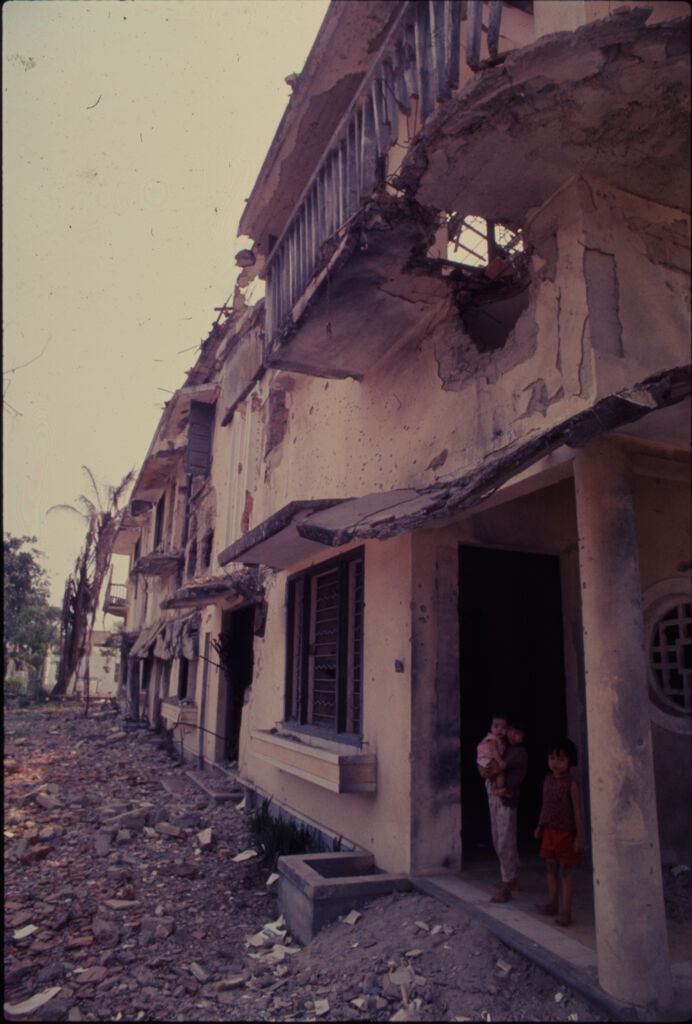 Untitled (Damaged Buildings And Debris In Street, Hue, Vietnam)