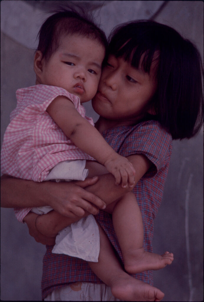 Untitled (Young Girl Holding Baby, Hue, Vietnam)