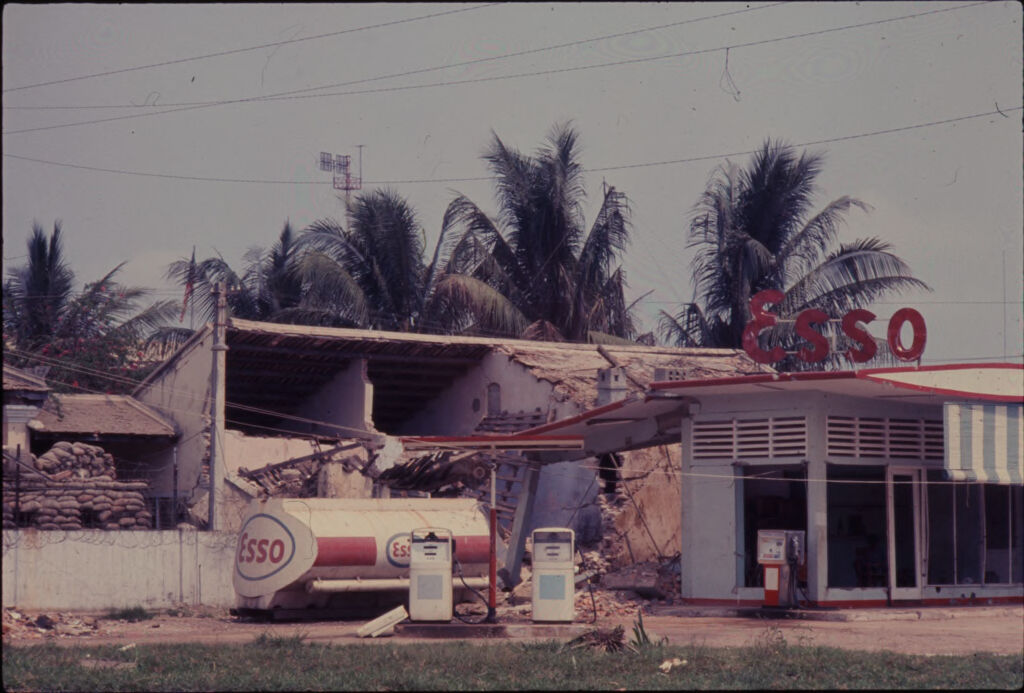Untitled (Esso Gas Station With Storage Building In Background, Hue, Vietnam)