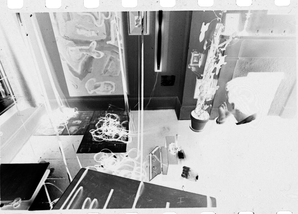 Untitled (Photographer Cutting And Hanging Film)