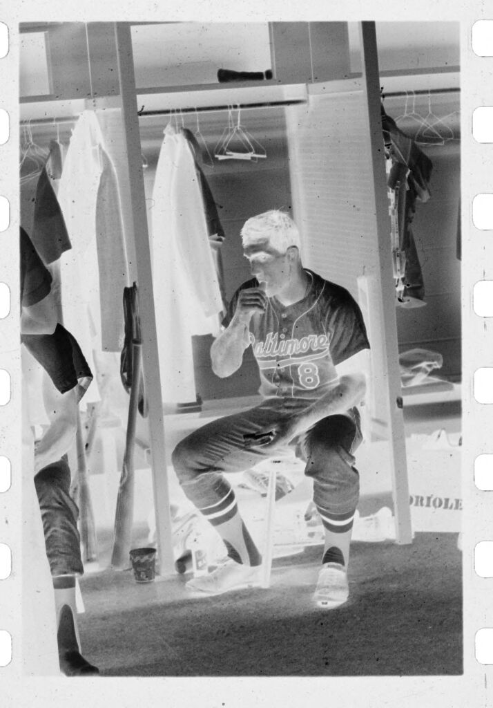 Untitled (Baseball Player Sitting In Front Of Locker)