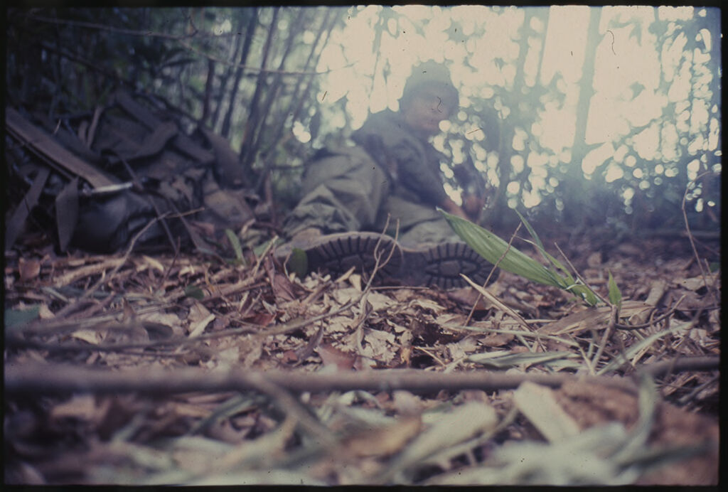 Untitled (Camouflaged Soldier On Watch In Jungle During Fighting In Central Highlands Near Dak To, Vietnam)