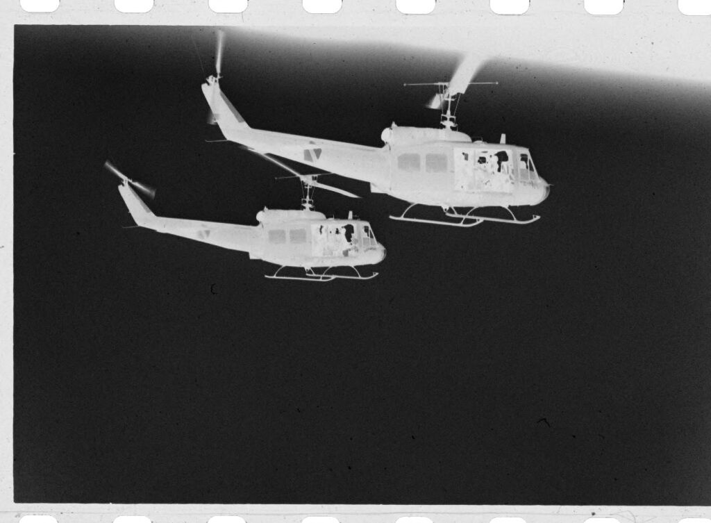 Untitled (Two Helicopters In The Air, Vietnam)