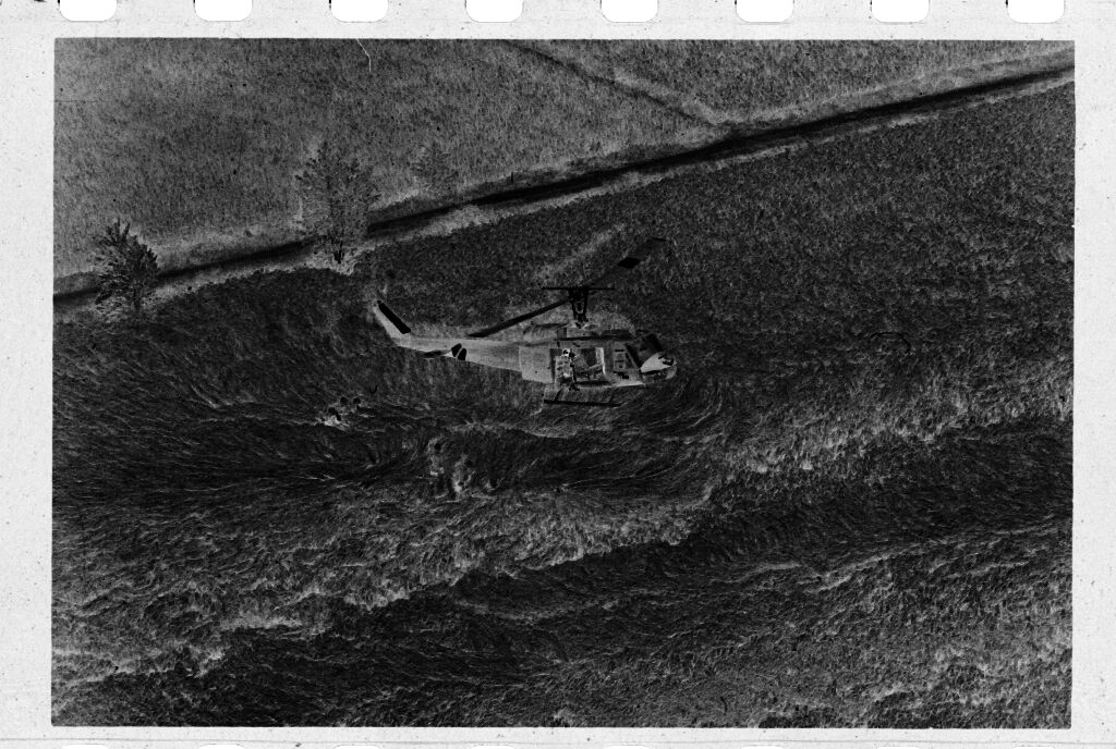Untitled (Aerial View Of Helicopter Landing In Field, Vietnam)
