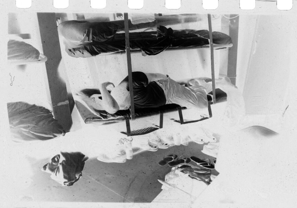 Untitled (Soldier Lying In Bunk (On Ship?), Vietnam)
