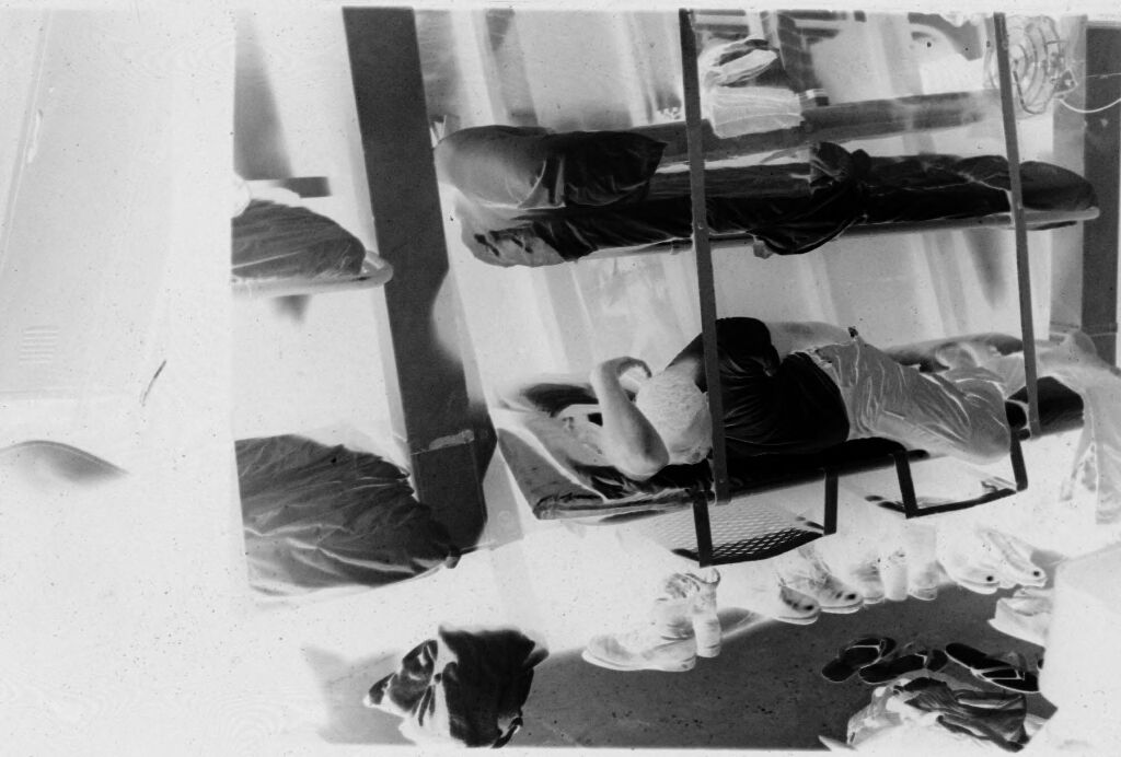 Untitled (Soldier Lying In Bunk (On Ship?), Vietnam)