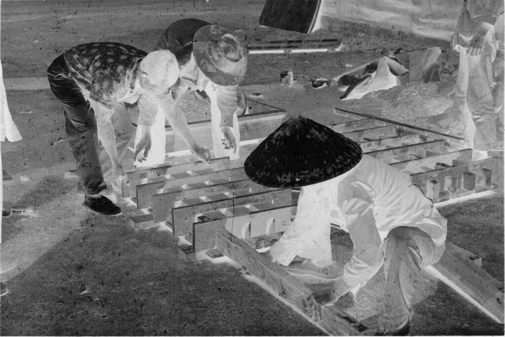 Untitled (Vietnamese Workers Constructing Wooden Crates(?), Vietnam)