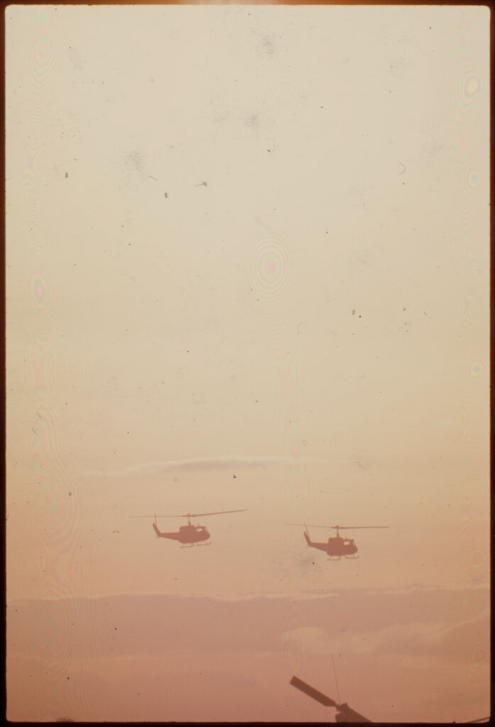 Untitled (Helicopters Flying Against Hazy Sunset, Vietnam)