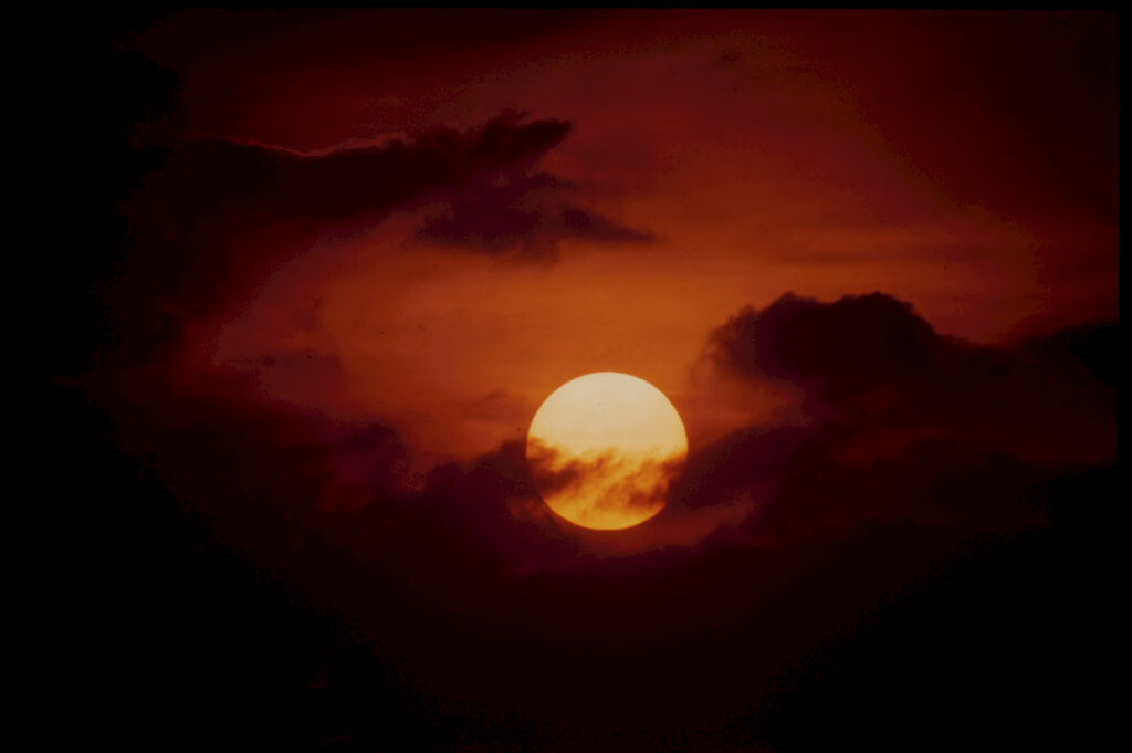 Untitled (Setting Sun Surrounded By Clouds, Vietnam)