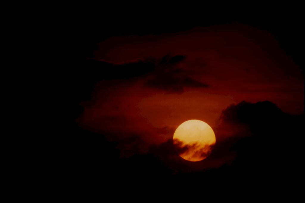 Untitled (Setting Sun Surrounded By Clouds, Vietnam)